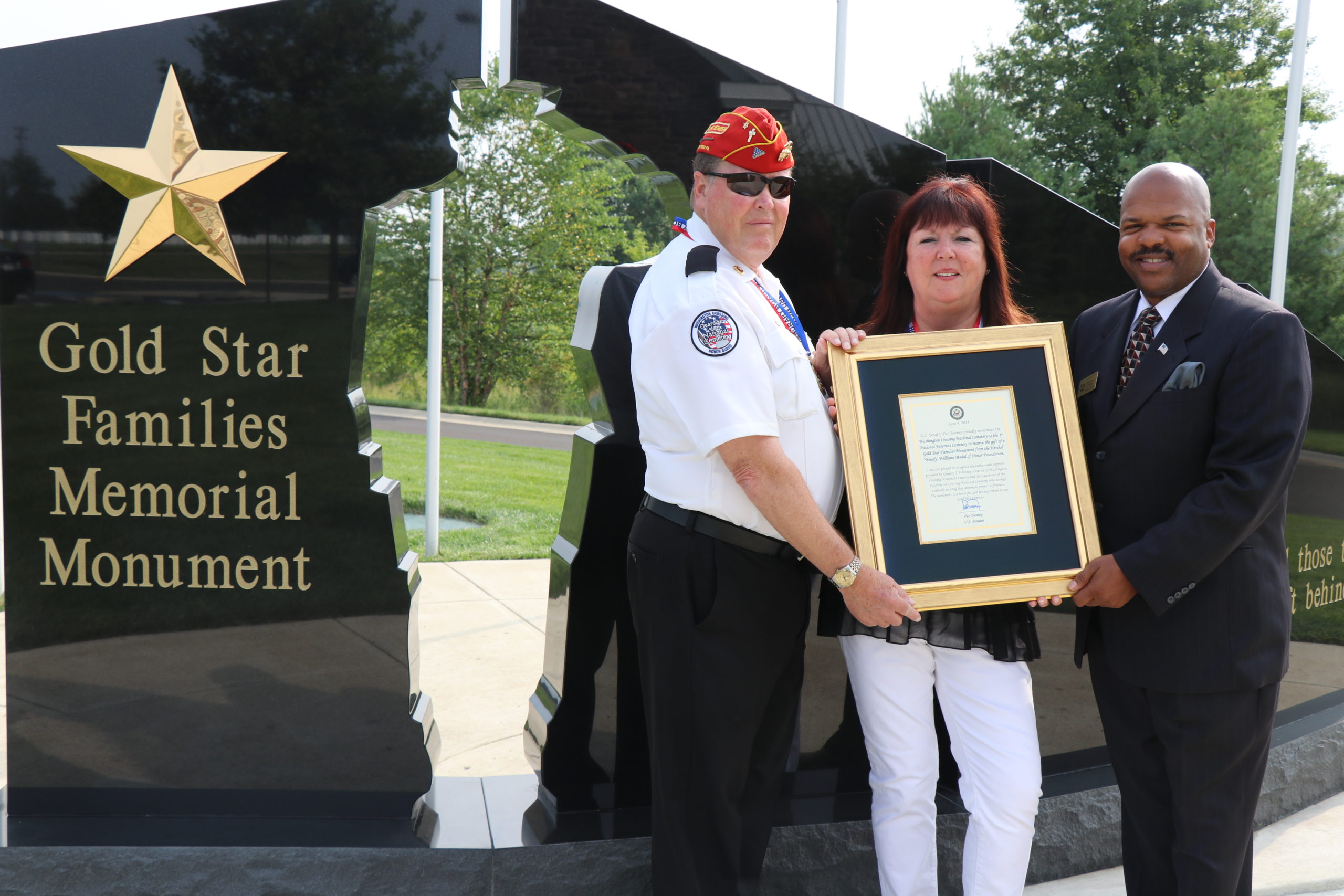 John & Bernadette Heenan presented a proclamation from Senator Pat Toomey (R-PA) to Director Gregory J. Whitney.